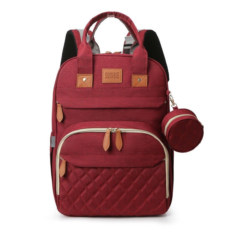 Pañalera con Cuna Portátil y USB - Evango Bebes SV